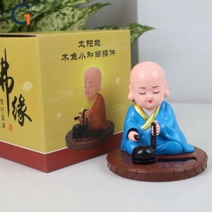 Tượng phật chú tiểu gõ mõ tụng kinh dùng pin nlmt màu xanh lam loại to